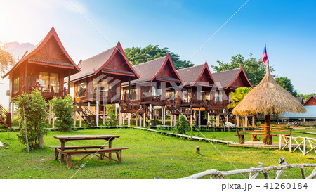 Village and bungalows along Nam Song River 41260184