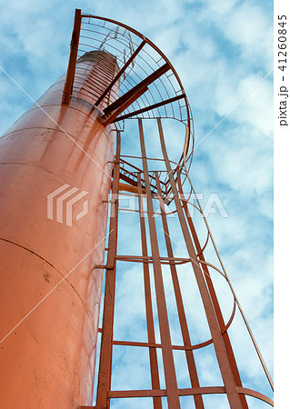 Low Angle View of Orange Water Tank. 41260845