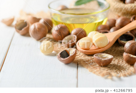Macadamia nuts on wood spoon 41266795