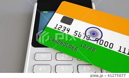 Payment or POS terminal with credit card featuring flag of India. Indian retail commerce or banking Payment or POS terminal with credit card featuring flag of India. Indian retail commerce or banking 41275077