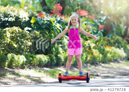 Child on hover board. Kids ride scooter. Child on hover board. Kids ride scooter. 41279728