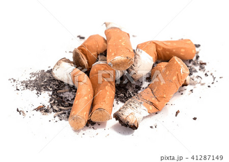 pile of cigarette butts and ash isolated on white pile of cigarette butts and ash isolated on white 41287149