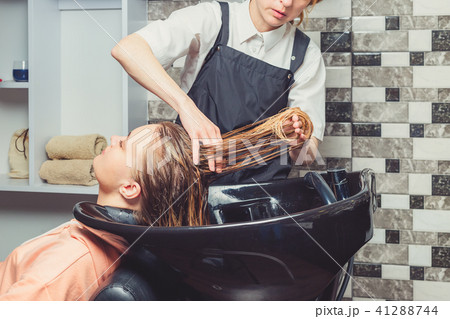 Hair wash procedure in a beauty salon Hair wash procedure in a beauty salon 41288744