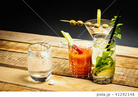 martini and bloody mary drink and water and hangover pills 41292148