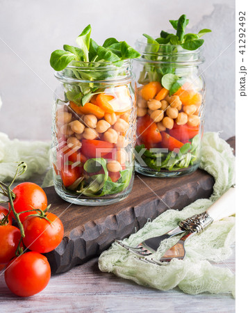 Fresh salad lunch served in mason jars Fresh salad lunch served in mason jars 41292492