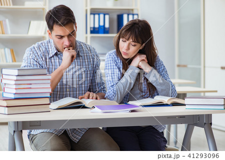 Students sitting and studying in classroom college 41293096