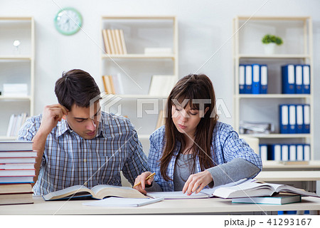 Students sitting and studying in classroom college 41293167