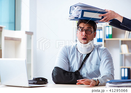 Injured man getting more work from his boss Injured man getting more work from his boss 41295066