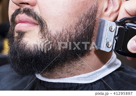 Beard styling and cut.  41295897