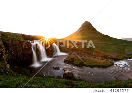 Colorful sunrise on Kirkjufellsfoss waterfall Colorful sunrise on Kirkjufellsfoss waterfall 41297577
