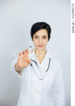 Female doctor having an injection. 41299173