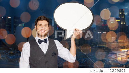 man with blank text bubble over singapore city 41299891