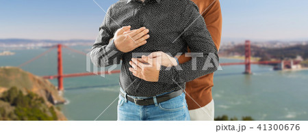 close up of hugging gay couple in san francisco 41300676