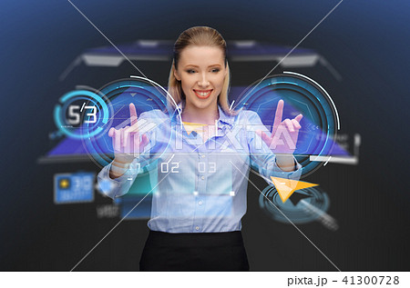 businesswoman with navigator on virtual screen 41300728