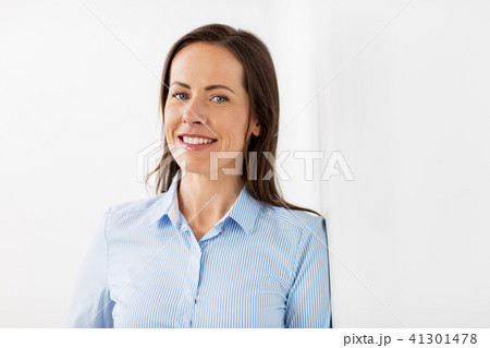 happy smiling middle aged woman at office happy smiling middle aged woman at office 41301478