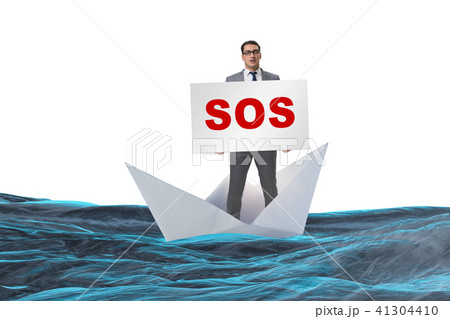 Businessman asking for help with SOS message on boat 41304410