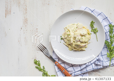 Spaghetti pasta with bolognese sauce and parmesan  41307133