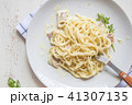 Spaghetti pasta with bolognese sauce and parmesan  41307135