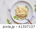 Spaghetti pasta with bolognese sauce and parmesan  41307137