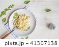 Spaghetti pasta with bolognese sauce and parmesan  41307138