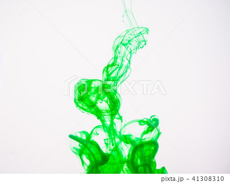 Green acrylic colour dissolving into water, close Green acrylic colour dissolving into water, close 41308310