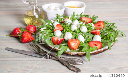 Delicious rucola salad with mozzarella. WEB Banner Delicious rucola salad with mozzarella. WEB Banner 41310440