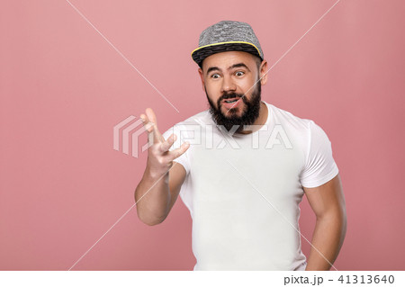 shoked bearded football fan screaming. 41313640