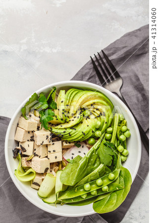 Green buddha bowl with tofu, rice, avocado Green buddha bowl with tofu, rice, avocado 41314060