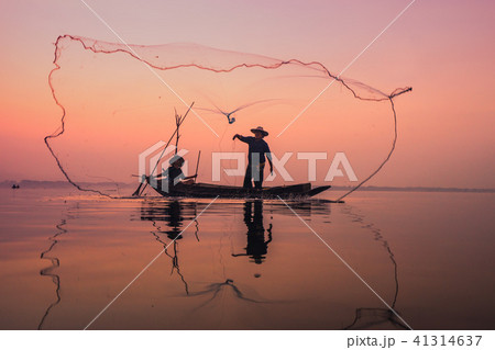 Fishermen using nets to catch fish Fishermen using nets to catch fish 41314637