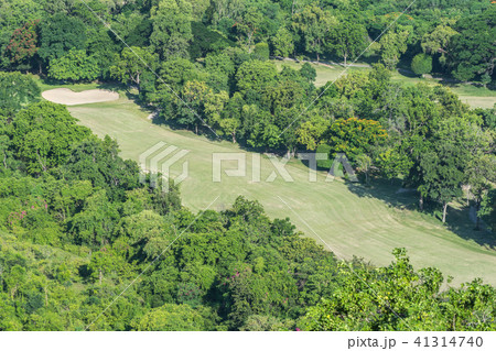 Golf course in aerial view with grass green field 41314740