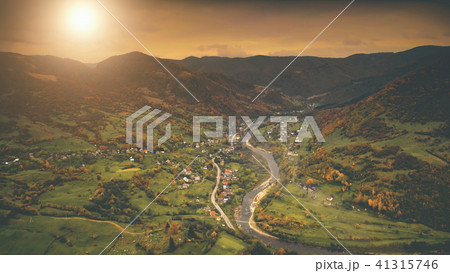 Aerial View: autumn canyon village along the river Aerial View: autumn canyon village along the river 41315746