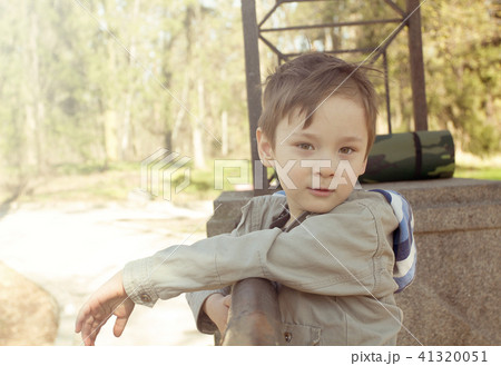 Happy child playing outdoors 41320051