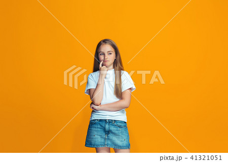 Young serious thoughtful teen girl. Doubt concept. Young serious thoughtful teen girl. Doubt concept. 41321051