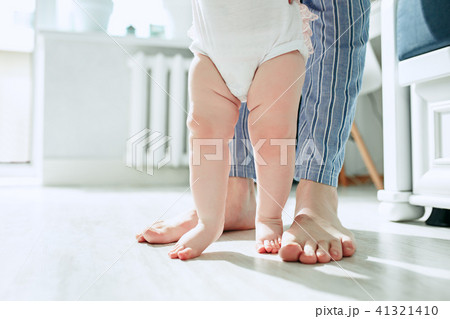 father and his baby daughter at home father and his baby daughter at home 41321410