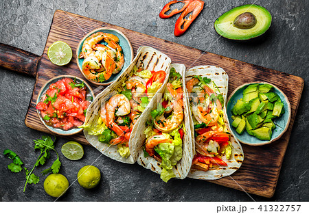 Shrimps tacos with salsa, vegetables and avocado. Mexican food 41322757