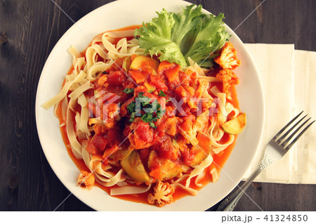 Ribbon pasta with Vegetables and Arrabiata sauce. Ribbon pasta with Vegetables and Arrabiata sauce. 41324850