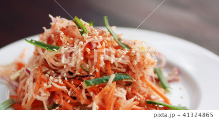Vegan salad with carrot and radish. Asian cuisine. 41324865