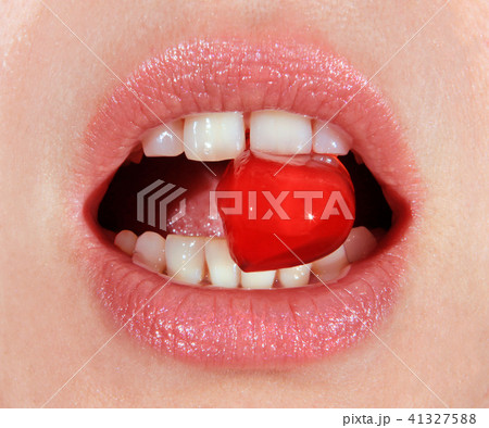 red lollipop in mouth red lollipop in mouth 41327588