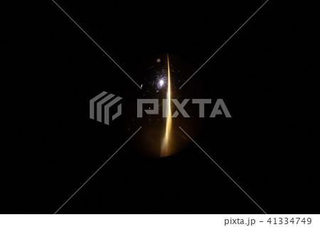 Cat's eye ruby isolated on black 41334749