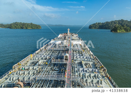 Oil tanker proceeding through Panama Canal. 41338638