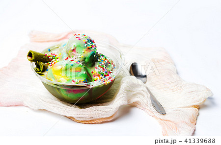 Green tea and fruit ice cream in a cup 41339688