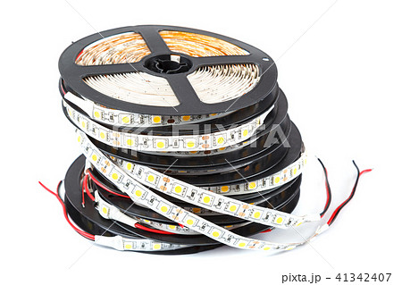 Reels with ribbons of LED lamps on white Reels with ribbons of LED lamps on white 41342407