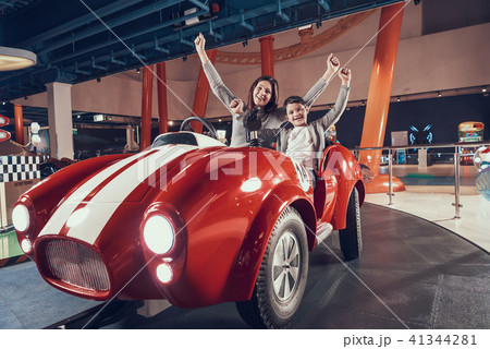 Happy smiling mother and son in amusement center 41344281
