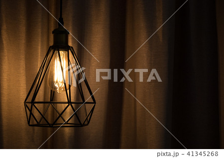 Yellow lamp hanging with curtain background 41345268