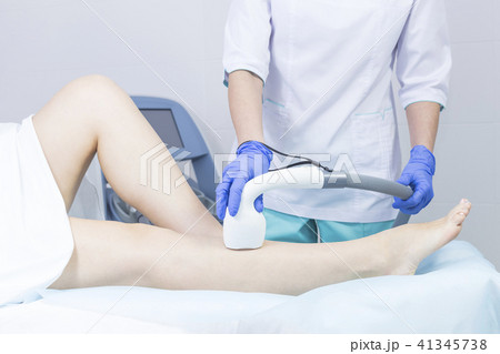 The process of laser depilation of female limbs in 41345738