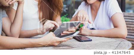 asian women drink coffee and talk with friends. asian women drink coffee and talk with friends. 41347645