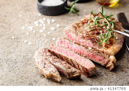 Medium rare grilled steak 41347769