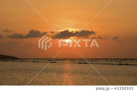 The sun fell into the water at the lake  The sun fell into the water at the lake  41350335