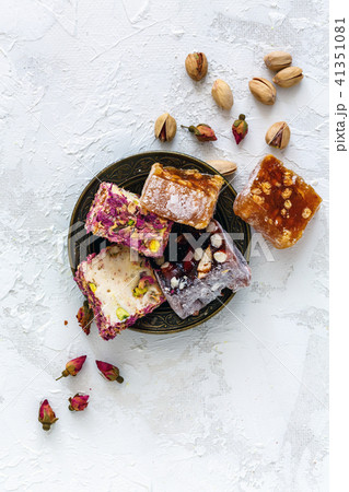 Mixture of Turkish delight on a bronze plate. Mixture of Turkish delight on a bronze plate. 41351081