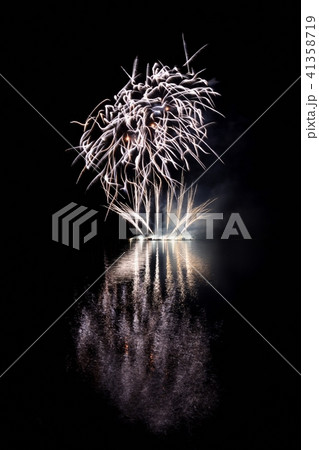 Beautiful colorful fireworks with reflections. 41358719